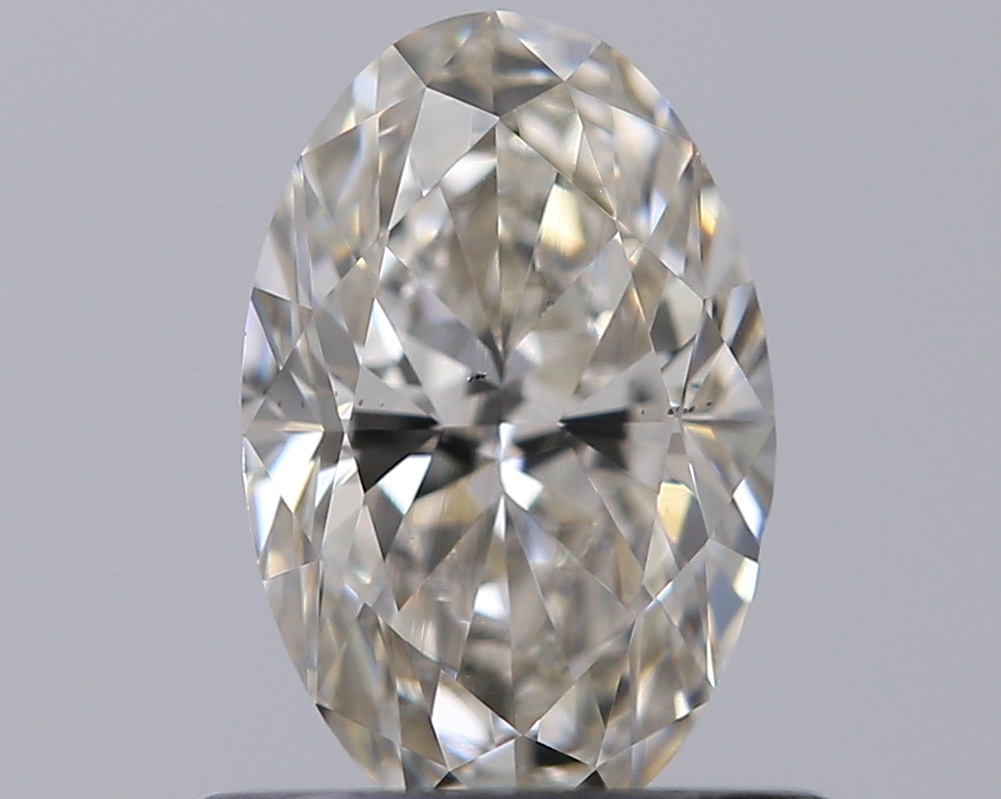 0.6 ct Přírodní Oval J VS2