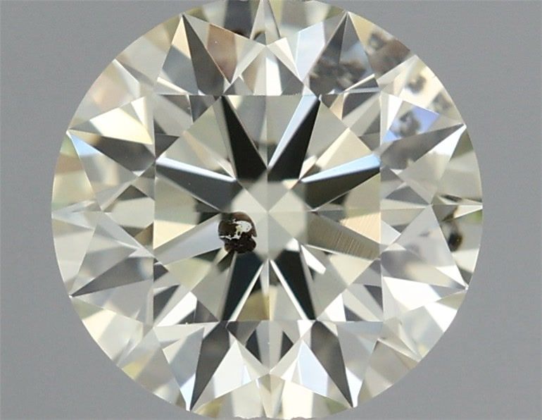 0.65 ct Přírodní Round brilliant U-V SI2