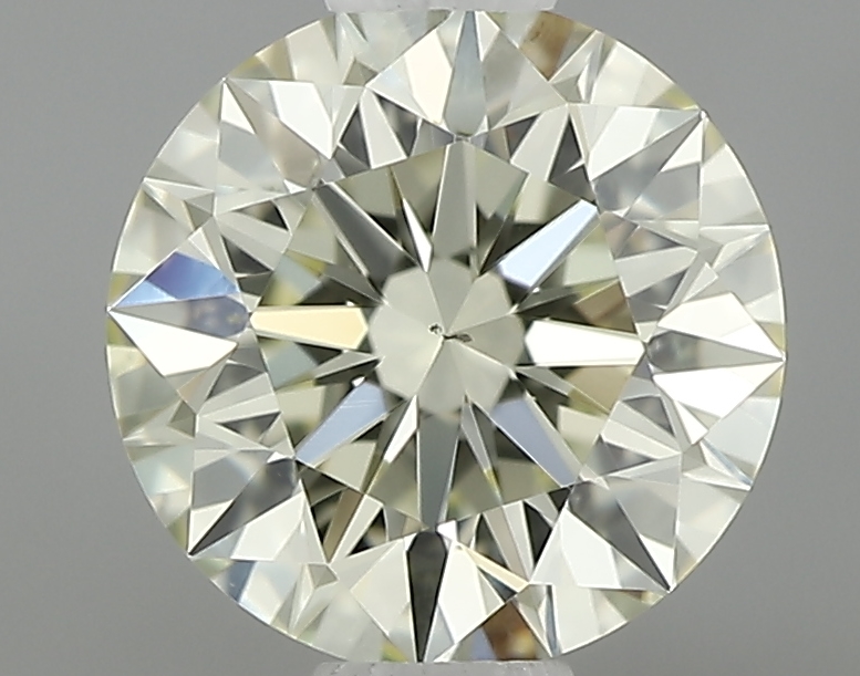 0.57 ct Přírodní Round brilliant Q-R VS2