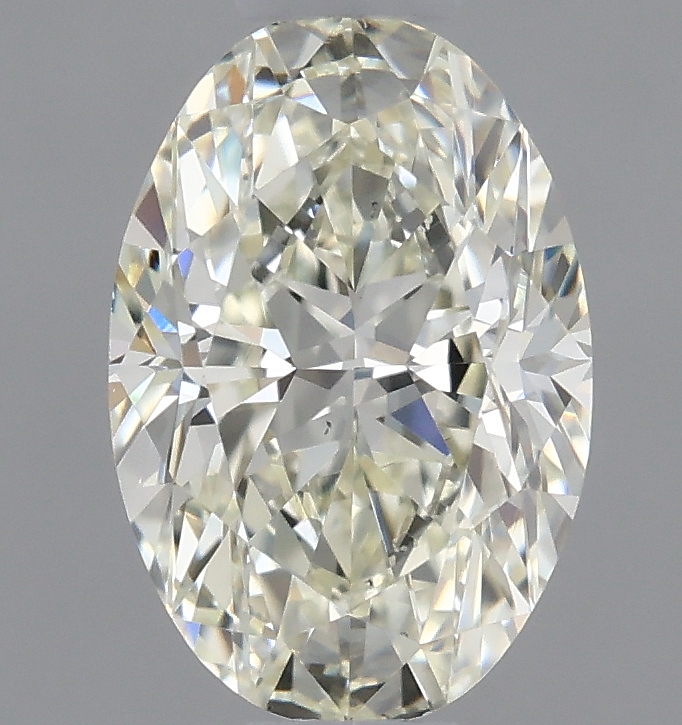 0.6 ct Přírodní Oval K VS2